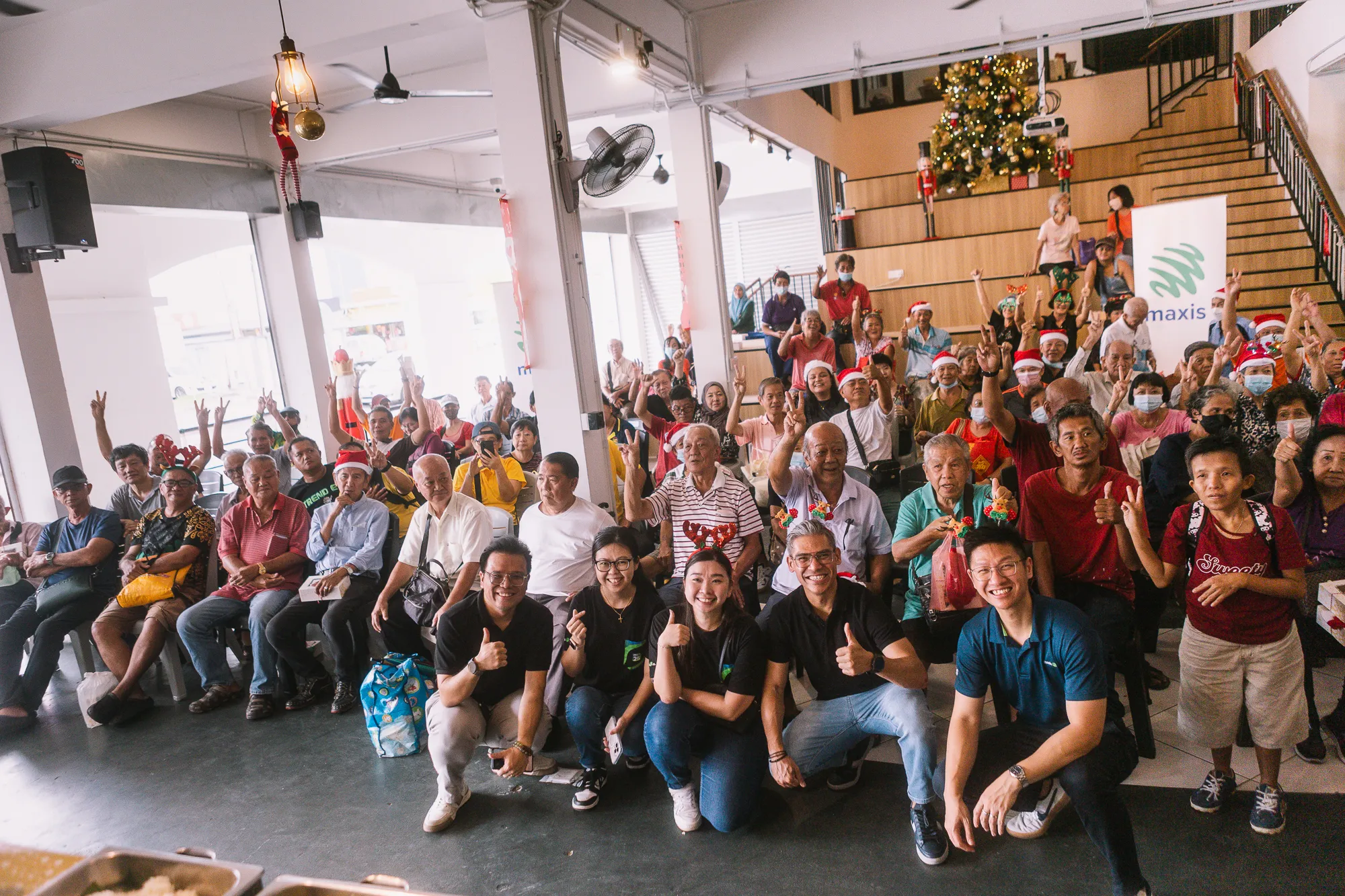 Maxis brings festive cheer to the community at Kuching CSSC in the spirit of Christmas - Photo 1