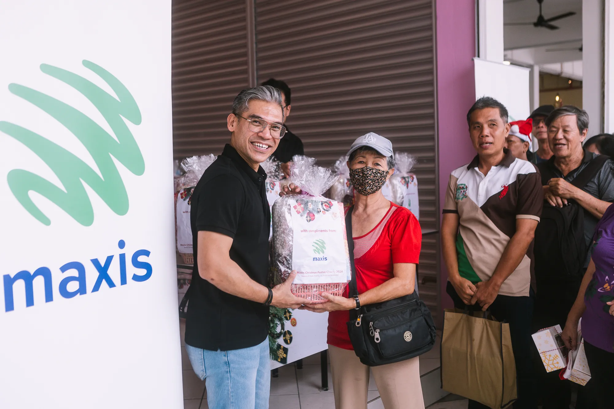 Maxis brings festive cheer to the community at Kuching CSSC in the spirit of Christmas - Photo 2