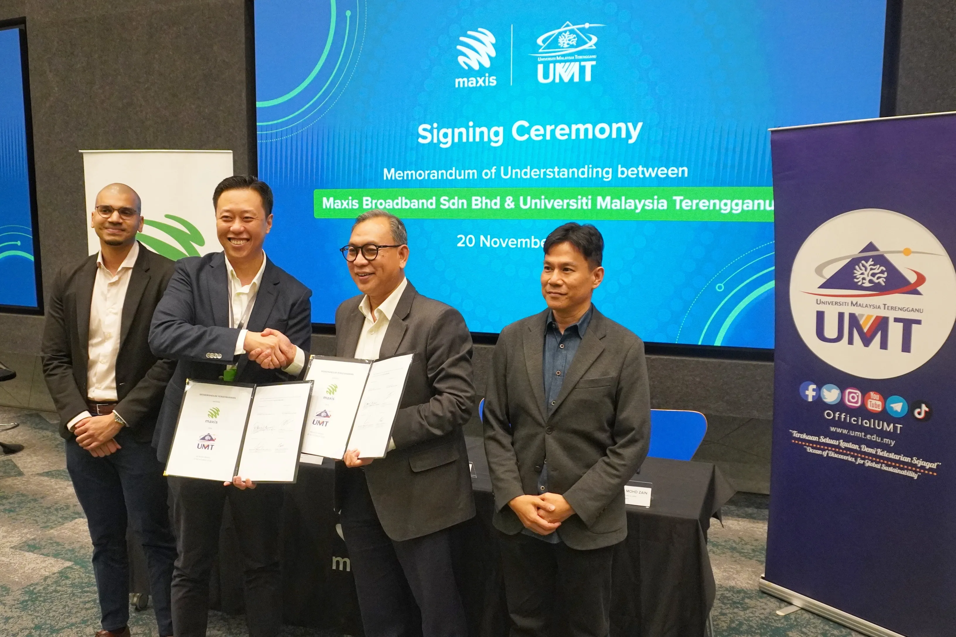 Maxis - UMT MoU Exchange